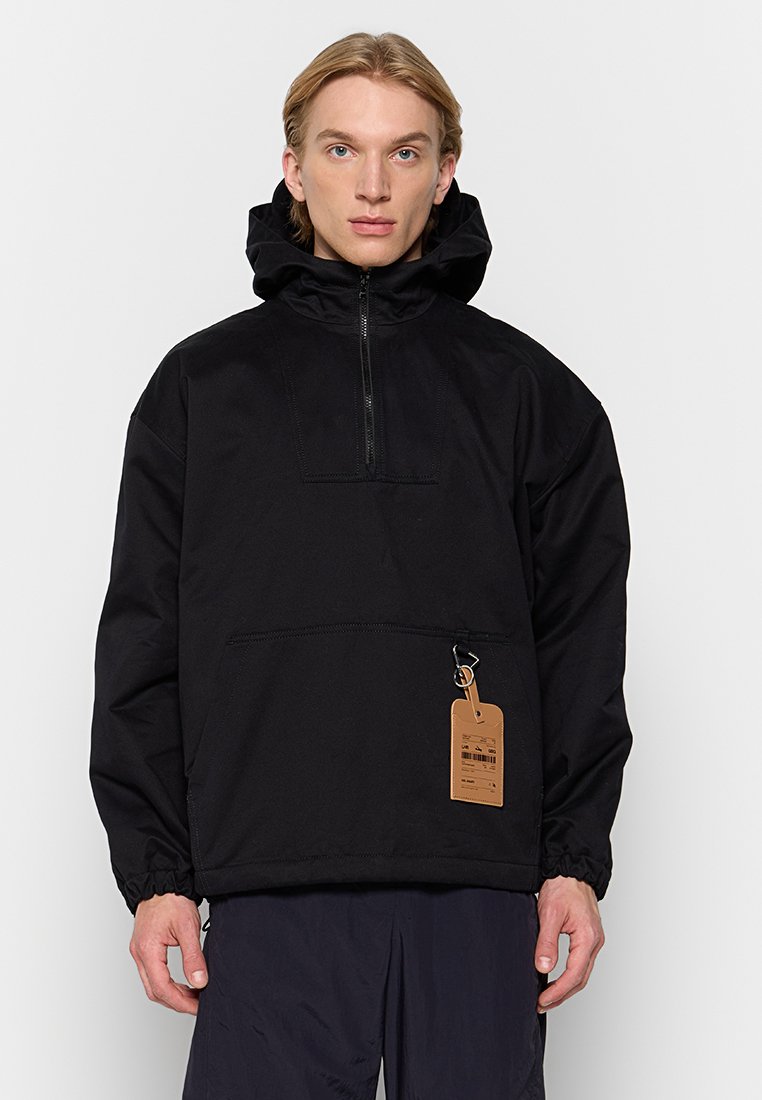 Axel Arigato Lichte jas zwart