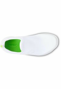 White slip-on shoe with a smooth, flexible upper. Features a green insole and rounded toe. Textured detailing on the footbed, minimalistic design.