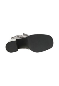 Semelle en caoutchouc noire avec grip texturé, présentant une forme arrondie et des bords renforcés ; la partie supérieure est en matériau gris lisse avec des détails.