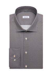 Chemise habillée pour homme pliée avec un petit motif géométrique noir et blanc, poignets boutonnés et col italien.