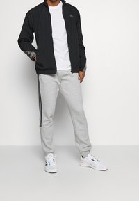 adidas Performance Pantalones deportivos - grey