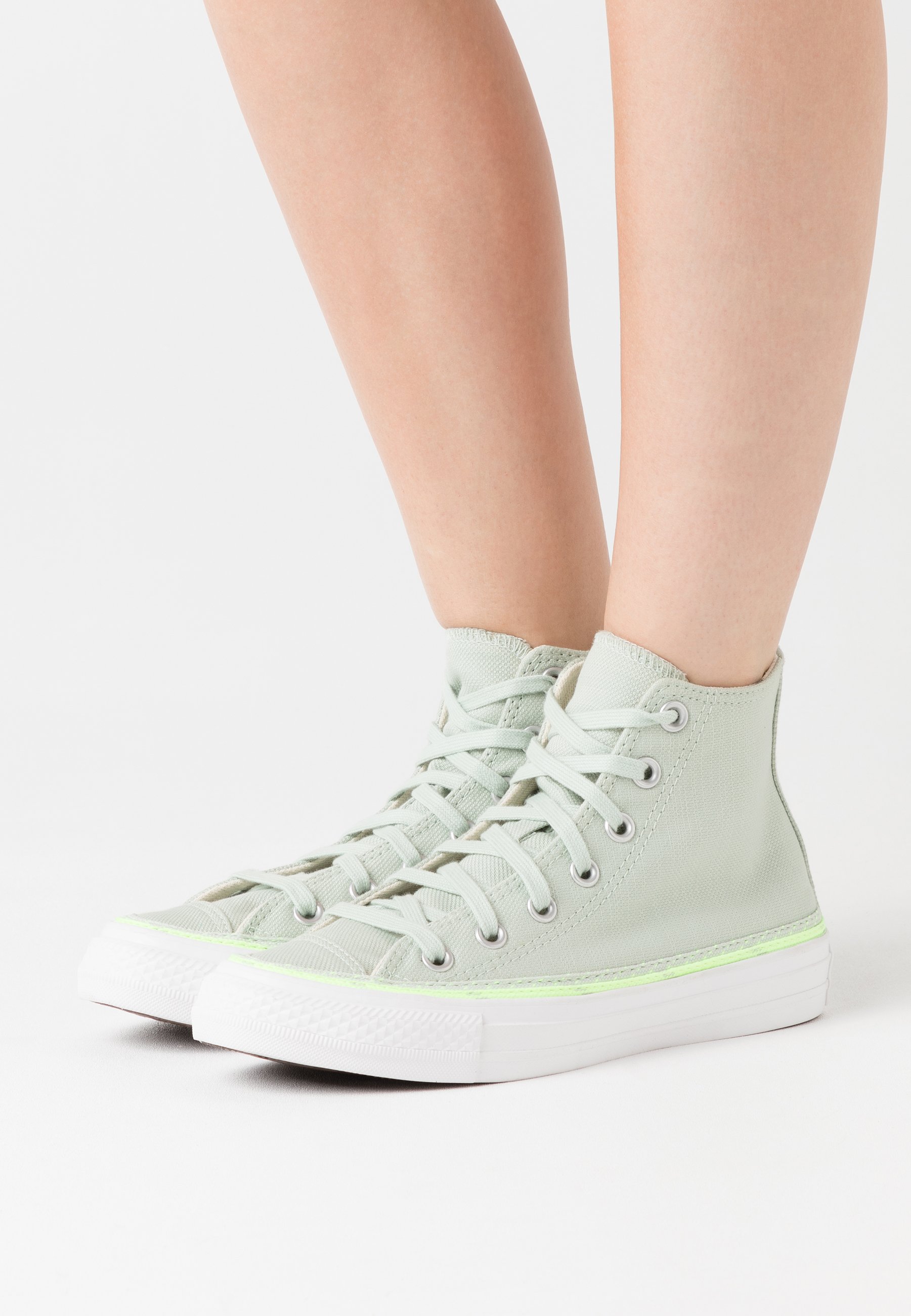 green and white chuck taylors