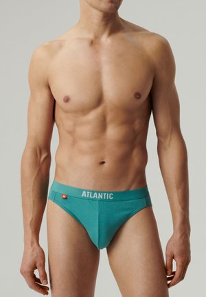 Turkusowe męskie slipki o miękkiej fakturze, z białym logo "ATLANTIC" na elastycznym pasie. Minimalistyczny design, dopasowany krój.