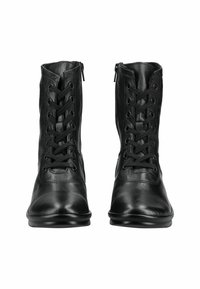 Botas de tobillo de cuero negro con un diseño de cordones en la parte delantera, cremalleras laterales, textura suave y puntera redonda. Suelas de goma resistentes para mayor agarre.
