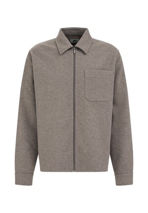 Gray fleece jacket with a front zipper, pointed collar, and left chest pocket. Features long sleeves with ribbed cuffs. Simple, minimal design.