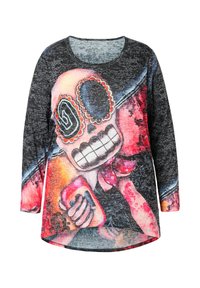 Long-sleeve shirt with a black marled background, featuring a colorful skull graphic with floral accents and a bowtie, rounded hem design.
