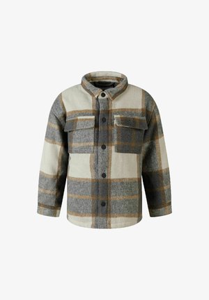 Kockás flaneling szürke, bézs és barna színekben, gallérral, két mellzsebbel és fekete gombokkal. Puha tapintású, hosszú ujjú és laza fazonú.