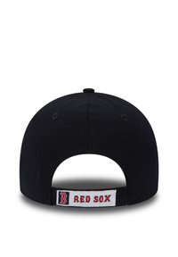 Black baseball cap featuring a flat brim, adjustable strap, and a white label with red "B RED SOX" lettering on the back.