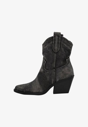 Black denim ankle boot with a pointed toe, textured fabric, and a 3-inch block heel. Features a pull tab at the back for easy wear.