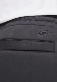 Nike Sportswear M NK TCH FLC PANT RI - Tréningruha alsók - anthracite/(anthracite)