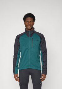 Türkisfarbene und schwarze Zip-Jacke mit langen Ärmeln, hohem Kragen und einer Brusttasche. Aus weichem Material gefertigt, mit glatter Textur und schlankem Design.