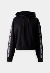 Zwarte cropped hoodie met een trekkoordkap, voorzien van lange mouwen met witte "KARL LAGERFELD" tekst langs de zijkanten. Soepele textuur.