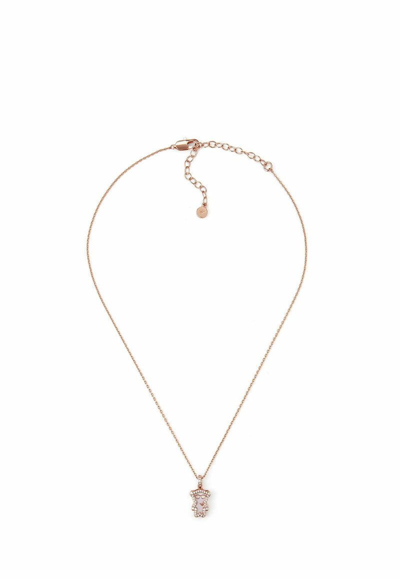 Ruusukultainen kaulakoru, jossa on herkkä ketju, ja karhunmuotoinen riipus, jota koristavat kirkkaat läpikuultavat kivet sekä pieni silmukka kiinnittämistä varten.