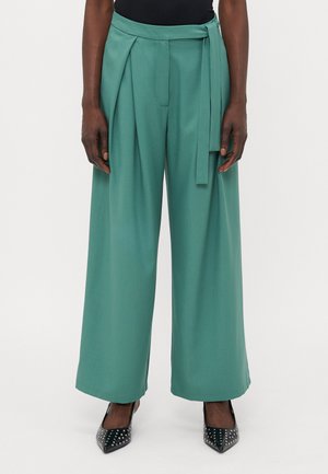 Pantaloni - emerald green