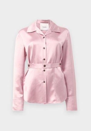 Light pink satin shirt with a collar, long sleeves, and button closure. Features a matching fabric belt and prominent front pocket details.