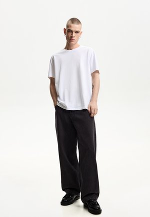 Bershka SUPER BAGGY - Löst sittande jeans - grey