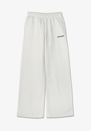 White wide-leg sweatpants with an elastic waistband, side pockets, and black "PEGADOR" text detail on the left thigh. Smooth texture.