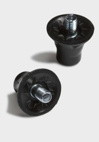 Piedini in gomma nera con design circolare, dotati di un inserto metallico filettato. Superficie textured con un motivo a stella attorno ai bordi.