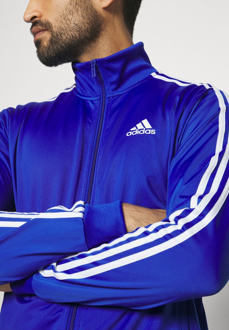 adidas Sportswear Tracksuit semi lucid blue/blue Zalando.co.uk
