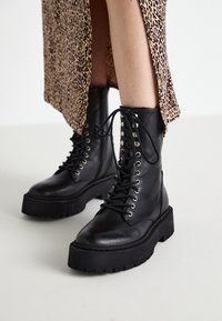 SKYWEN - Lace-up ankle boots - black