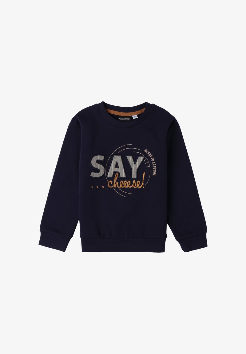 Granatowa bluza dziecięca z napisem "SAY chees!" oraz okrągłym haftem z przodu, z długimi rękawami i okrągłym dekoltem.