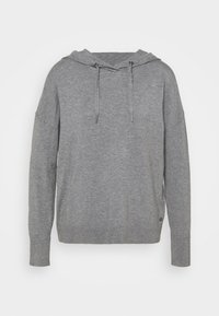 Sweat-shirt à capuche gris fabriqué en matériau doux, avec une coupe ample, des poignets côtelés et des cordons de serrage au niveau du cou.