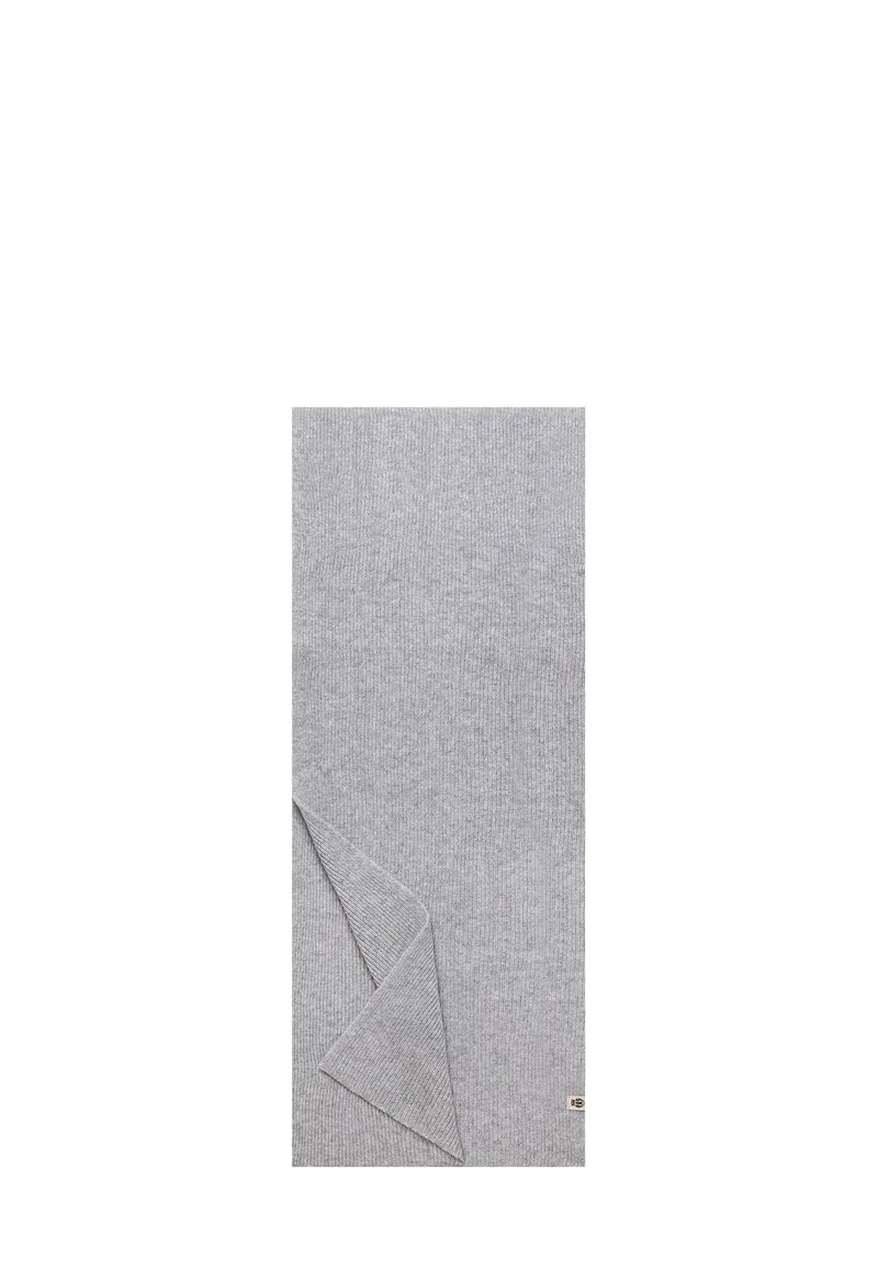 Gray knitted blanket with ribbed texture, folded at one corner, featuring a small logo tag in the lower right. Soft material, rectangular shape.