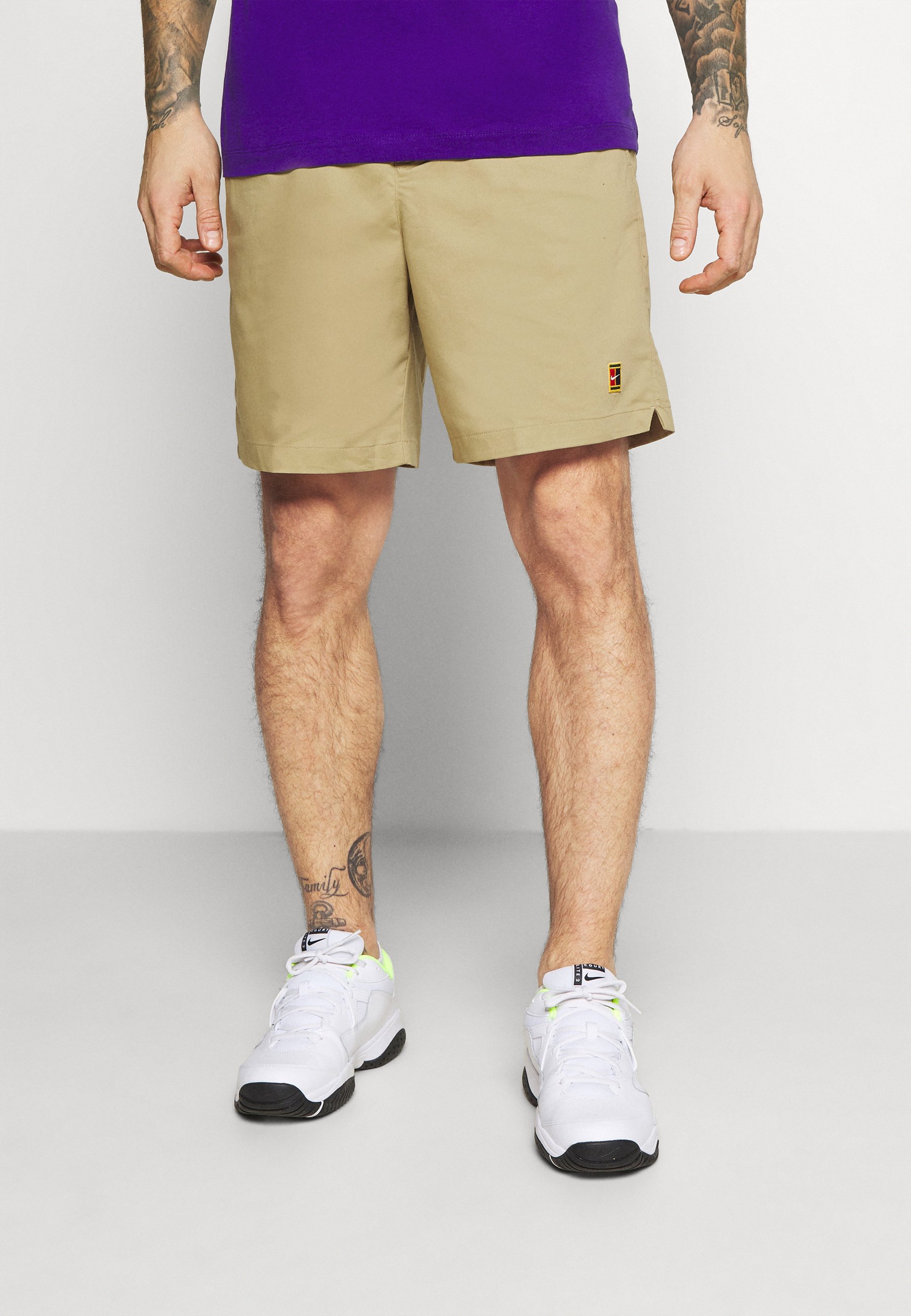 beige nike shorts