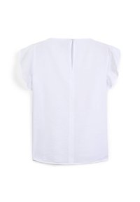 Blusa bianca a maniche corte con cucitura posteriore e una piccola apertura, realizzata in un tessuto leggero con una texture liscia.