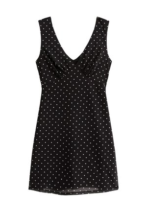 Black dress with white polka dots, sleeveless design, V-neck, gathered fabric at the bust, knee-length hem. Smooth texture.