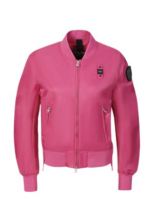 Pink bomber jacket with front zipper, two zippered pockets, ribbed cuffs and hem, and black patch on the upper left sleeve.