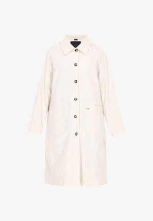Let vægt, cremefarvet frakke med krave, knaplukning foran, to forlommer og lige snit. Har tekstureret stof og kontrastfarvede knapper.