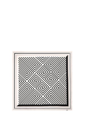 Black and white patterned scarf featuring spirals and lines on a smooth fabric, with a bordered edge and contrasting accents.