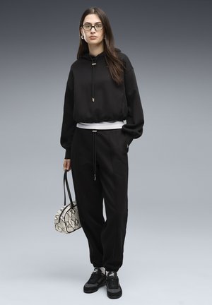 Puma, - Spodnie treningowe