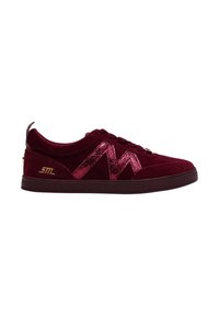 Burgundy sneakers made of velvet with a textured finish, featuring a metallic pink wave design and black rubber sole. Gold logo on heel.