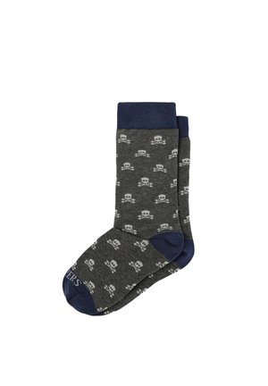 Dark gray socks with navy blue cuffs, heels, and toes, decorated with a repeating white skull and crossbones pattern.