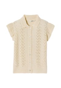 Cardigan en tricot crème, avec des manches courtes, un col, une fermeture à boutons et un motif ajouré sur l'ensemble. Texture douce et coupe ajustée.
