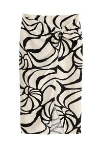 Zwarte en crèmekleurige rok met een bloemenpatroon, knoopdetails aan de voorkant en een zijsplit, gemaakt van lichtgewicht stof.