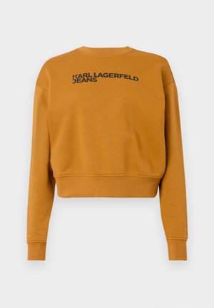 Sweatshirt laranja cortado em tecido suave, com o logótipo preto "KARL LAGERFELD JEANS" na frente e punhos em ribana nas mangas.
