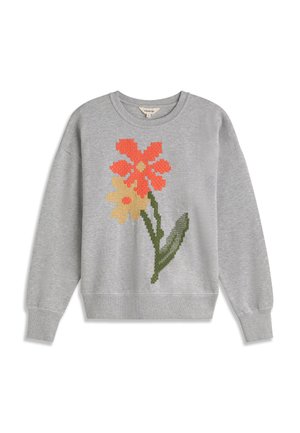 Lichtgrijze sweatshirt met lange mouwen, met een gepixelde oranje en gele bloem en een groene steel aan de voorkant.