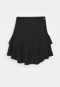 Jupe noire en couches avec un motif floral texturé, présentant une taille ajustée et trois volants au bas.