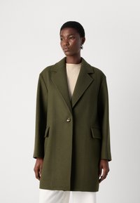 Olive green wool-blend coat with a notched collar, single button closure, and two front pockets, featuring a structured, elongated silhouette.