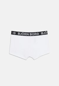 Bele bokserice bele barve z črnim elastičnim pasom, na katerem je v belem napisu "BJÖRN BORG". Gladka tkanina s prilegajočim dizajnom.