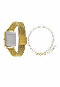 Goldene Mesh-Uhr mit rechteckigem Zifferblatt und rückseitigem Edelstahl, kombiniert mit einem goldenen Armband mit klaren Kristallakzenten.