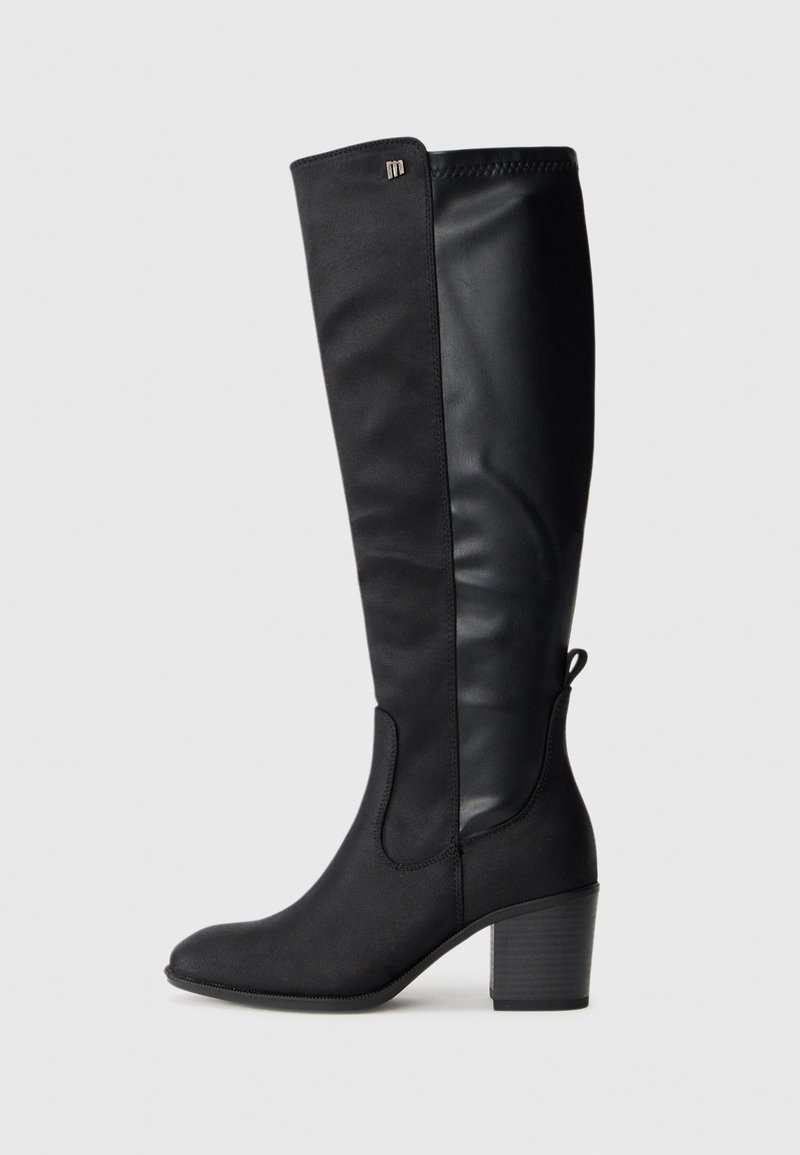 Knee-high black boots with a matte finish and faux leather texture. Block heel and elastic side panels. Decorative emblem near the top.