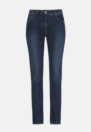 Tmavomodré priliehavé džínsové nohavice s predným gombíkom, zipsovým zapínaním a prednými a zadnými vreckami, zobrazené na jednoliatom pozadí.