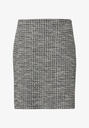 Mini-jupe texturée en noir et blanc avec une silhouette ajustée et un motif tissé subtil.