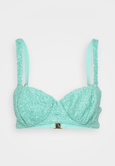 Sutiã de contas verde menta com um acabamento texturizado, apresentando alças ajustáveis e um fecho metálico na parte frontal central.