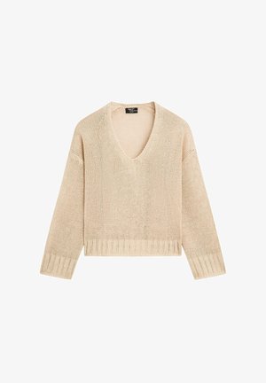 Maglione beige a maglia con scollo a V, maniche lunghe e orlo a costine. La texture è a maglia aperta, offrendo un aspetto leggero.