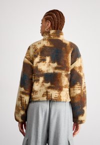 The North Face EXTREME - Felpa in pile - gravel/bleach dye/black